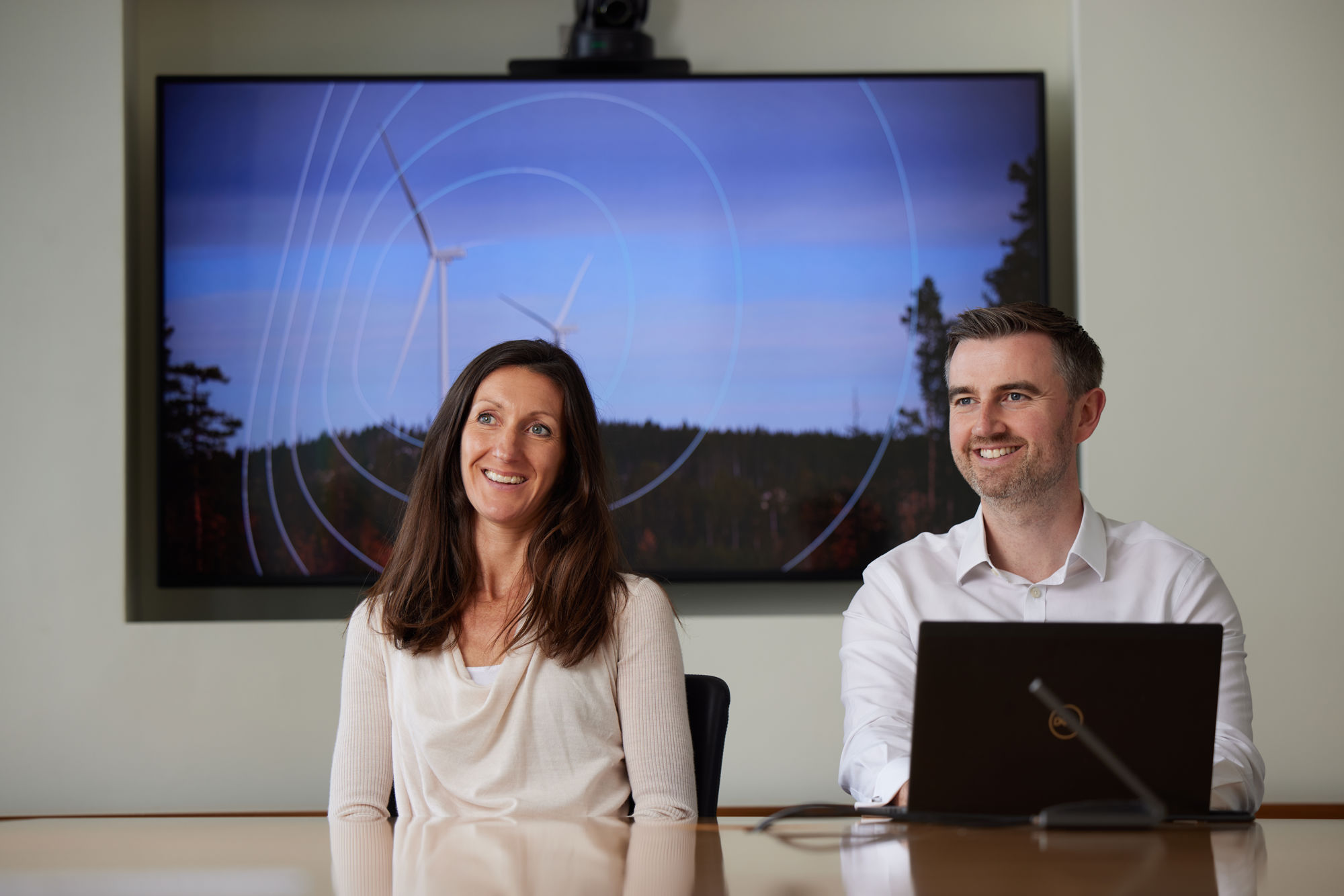 People in the office smiling